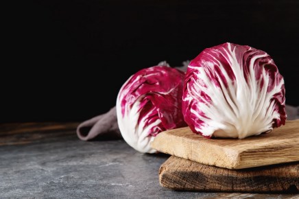 Radicchio on a dark background. Food for a vegan and a vegetarian. Diet, food concept.